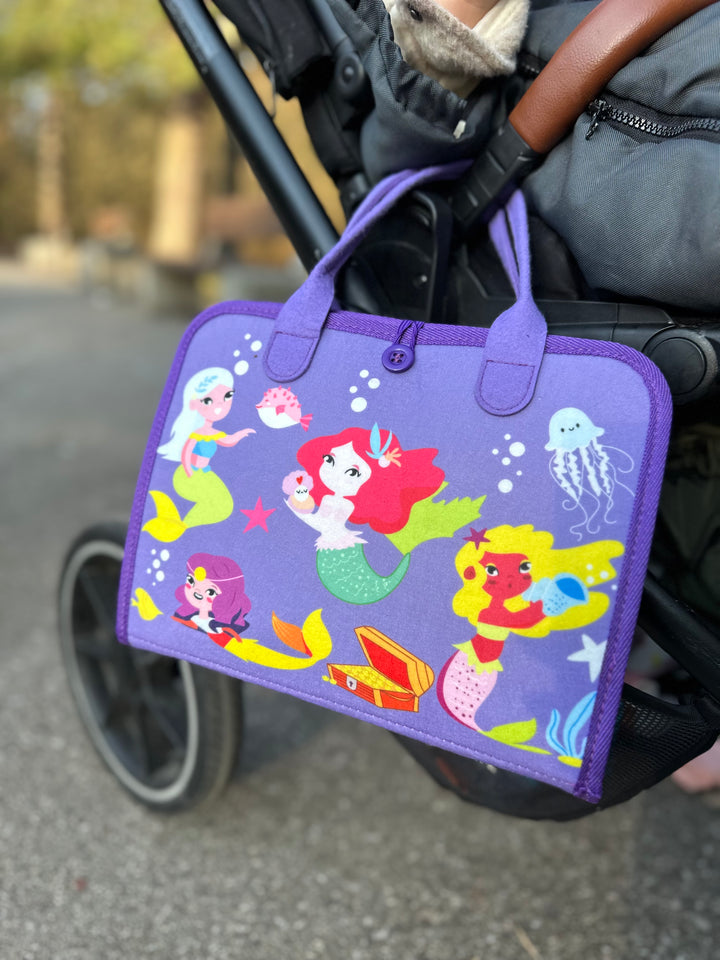 Kelioninė/lavinamoji Montessori užimtumo knygelė "Purple mermaids"